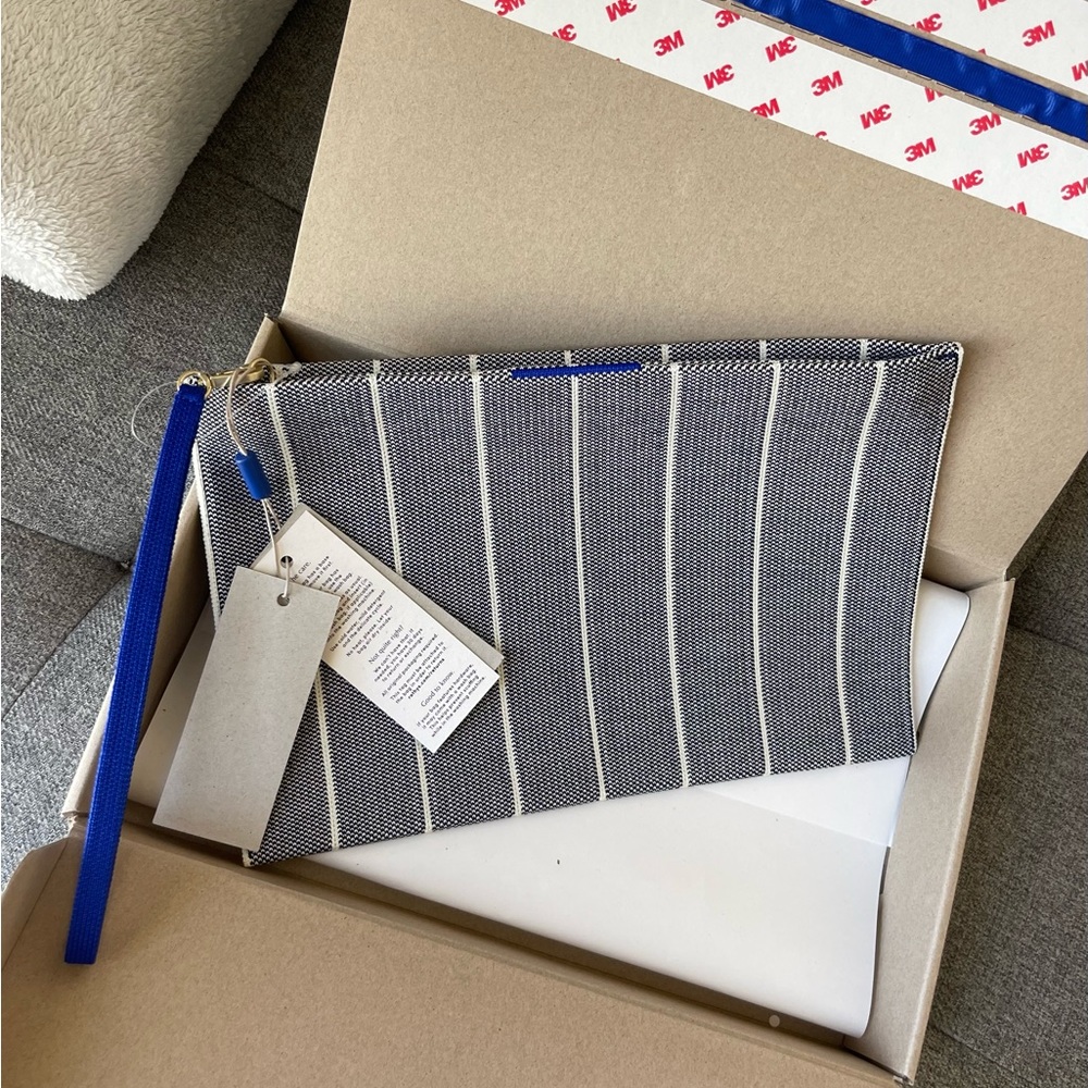 Rothy's Gray & White Striped Clutch with Blue Wristlet